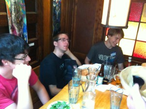 The Georgia Tech youngins shoot the shit away from the bar.